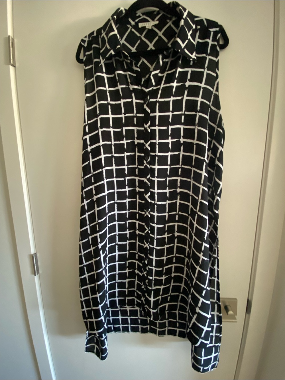 Spense Black & White Grid Midi Shirt with side slits.